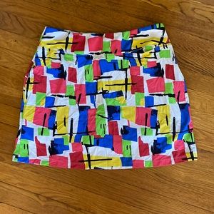 Colorful golf skirt. Size medium. Lots of pockets